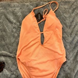 Peach one piece swim suit